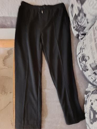 Crne pantalone sa ravnim nogavicama - Boja: crna - Kroj: ravan na lalafo.rs Crne pantalone sa ravnim nogavicama - Boja: crna - Kroj: ravan