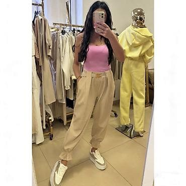 Women's Sweatsuits: ✅Ženske široke pantalone sa karnerima na nogavicama i kaišem
✅2400 din — 1