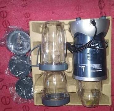 Blenderi, mikseri: Nutrobullet set od 12 delova. Set sadrzi bazu od 0. 7 litara, dve — 3