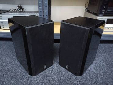 Foto i video kamere: Yamaha NX-E 100 Type: 2 way, 2 driver loudspeaker system Frequency — 7