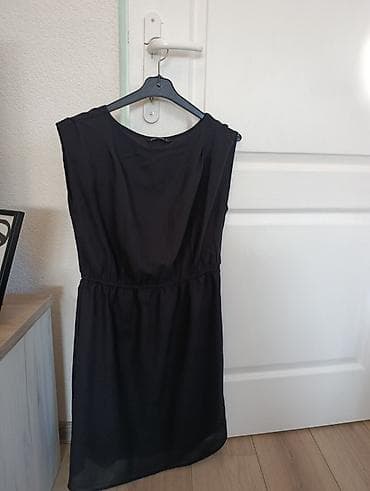 prsten sa opalom: Elegantna crna haljina bez rukava - Klasican kroj sa okruglim izrezom — 1