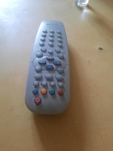 stalak za daljinski: Daljinski za tv,televizor Philips.
Ispravan — 2