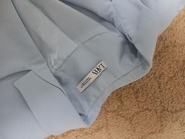 kompleti sako i pantalone: Elegantni ženski komplet – blejzer i top, svetloplave boje. - Brend — 2