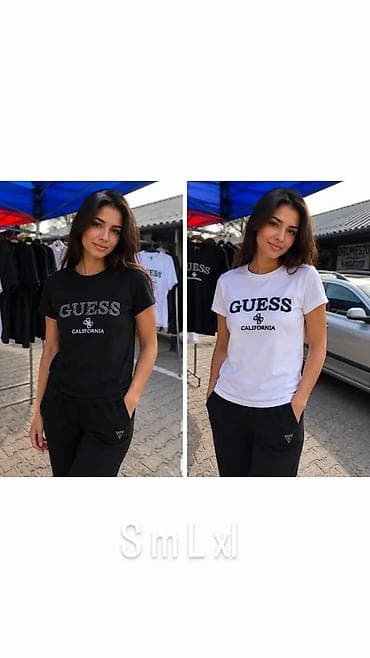 crne 97: Majica kratkih rukava brenda GUESS, dostupna u crnoj i beloj boji. A — 1