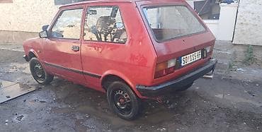 olovka za ogrebotine na autu: Yugo 55, crvena boja, trovratni hečbek. Ključne karakteristike: - — 2