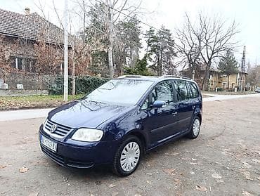 Volkswagen Touran: 1.9 l | 2005 г. MPV Body Type