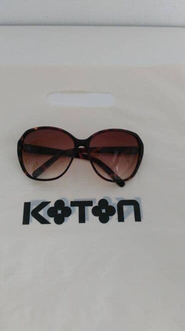 parke sa prirodnim krznom: Sunglasses, color - Black — 1