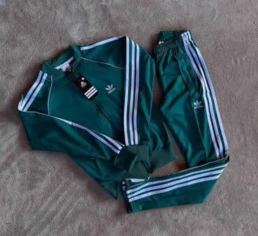 adidas beograd: Ženska trenerka klasičnog dizajna, prepoznatljiva po tri bele pruge — 6