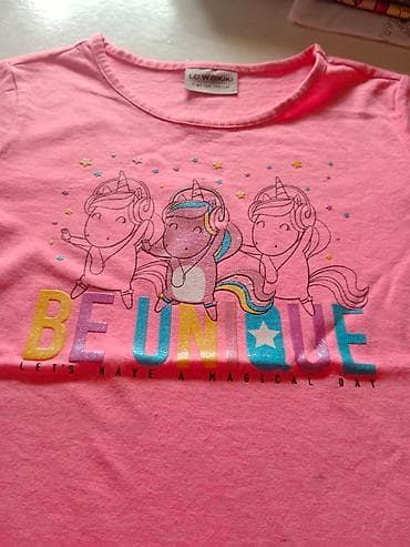 Majica LC Waikiki neon roze 🩷 Veličina 6-7 god 116 cm efektne boje ima