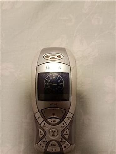 eksterni punjac: Siemens MC60 Telefon bukvalno nov,baterija nova,punjač,radi na svim — 3