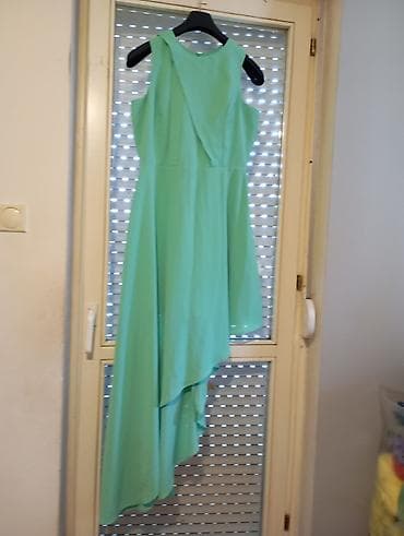 Asimetrična haljina bez rukava u mint zelenoj boji. Gornji deo sa na lalafo.rs Asimetrična haljina bez rukava u mint zelenoj boji. Gornji deo sa