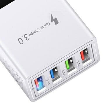 Nov punjač za mobilni telefon Quick Charge 3.0 sa četiri USB ulaza na lalafo.rs Nov punjač za mobilni telefon Quick Charge 3.0 sa četiri USB ulaza