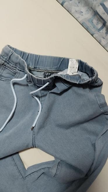 Laganije muške/ženske pantalone od svetlog denima (jogger stil) -