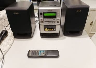 sporet na plin sa dve ringle: Mini linija Aiwa LCX-110 2x8W + daljinski Mini linija Aiwa korišćena — 1