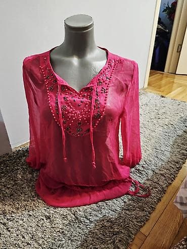Ružičasta tunika/bluza sa ukrasnim detaljima moze i za plazu