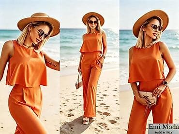 Kompleti: Elegantni ženski komplet – bluzica bez rukava + široke pantalone — 1