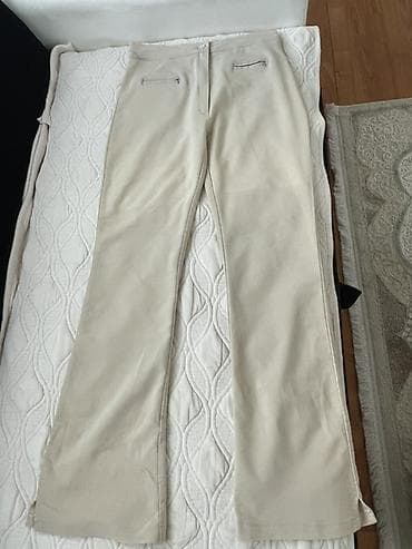 bata obuca srbija: Bež ženske pantalone sa blagim širenjem nogavica. Visina struka — 1