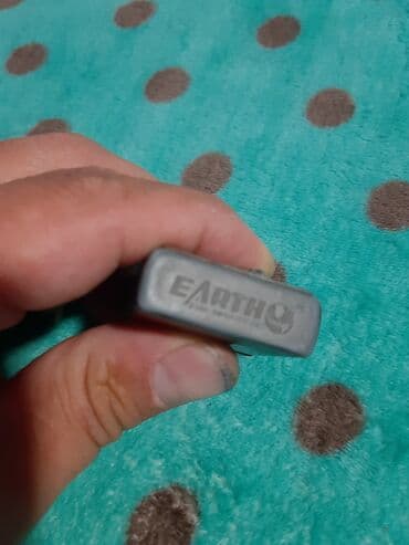 guess torbe na snizenju: Zippo lighter, Used — 2