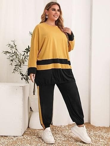 Trenerke komplet sirok gornji deo žuta boja sa crnim sarama i donji