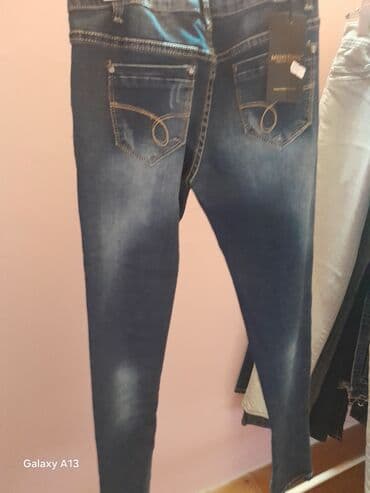 Farmerke: Ženske skinny farmerke – tamno plavi teksas sa blagim “washed” efektom — 2