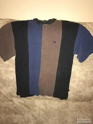 Original Fred Perry majica L/XL
100% cotton
Ramena 50cm, duzina 70cm