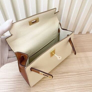 torbice new yorker: Elegantna ženska torba sa ručkom i kaišem za rame, u kombinaciji bež i — 2