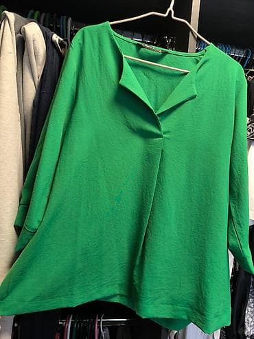 LC Waikiki zelena bluza sa dugim rukavima i V-izrezom. Bluza ima na lalafo.rs LC Waikiki zelena bluza sa dugim rukavima i V-izrezom. Bluza ima