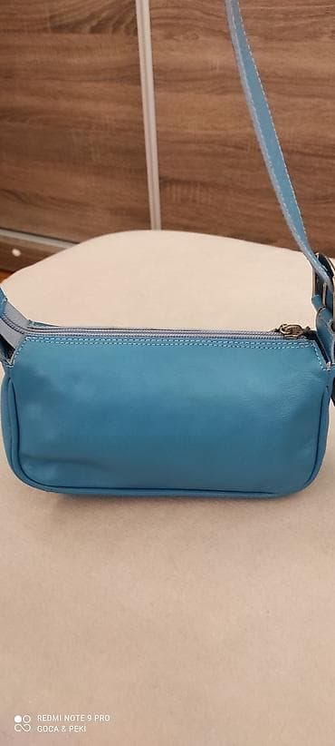 Galvez, nova Španska torbica od prirodne kože.
22cm X 13cm X 8cm na lalafo.rs Galvez, nova Španska torbica od prirodne kože.
22cm X 13cm X 8cm