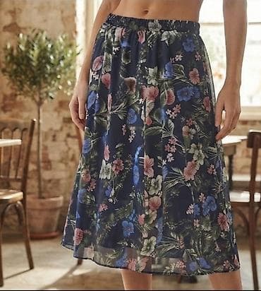 Lepršava suknja midi dužine sa floralnim printom. - Kroj: A-linija