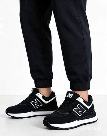 Muške patike New Balance – sportsko‑casual model crno‑bele boje. -