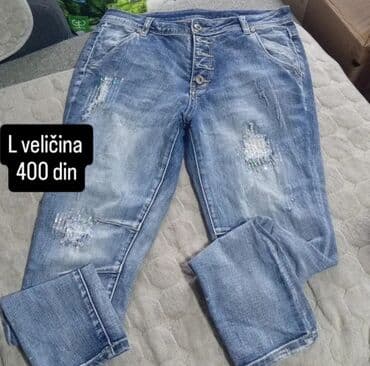 letnji kompleti sa pantalonama: Unisex farmerke u plavoj boji sa izbeljenim i iscepanim detaljima — 1