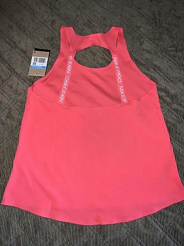 halji: Nike Pro Women's Dri-FIT Tank Top vel. XS, M 
Recycled Materials
IB — 6