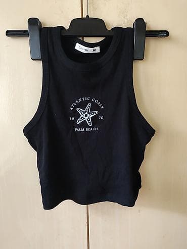 majice saim se: Crni ženski crop top bez rukava – Terranova, veličina M. - Materijal — 1