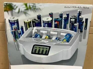 Ostala elektronika: *** AKCIJA **** 1826 Univerzalni punjač baterija Weltbild; Mogu se