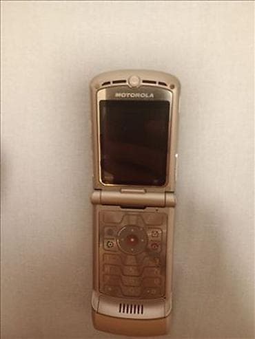 pegla na zar cena: Motorola V3 Motorola kao nova,baterija dobra,punjač,radi na svim — 1