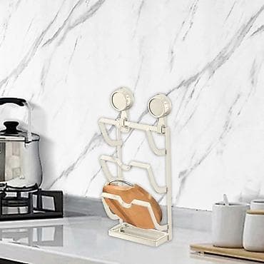 nelepljiva podloga za testo: 02. Držač za poklopce Cena: 2999 din Zidni držač za poklopce lonaca — 3