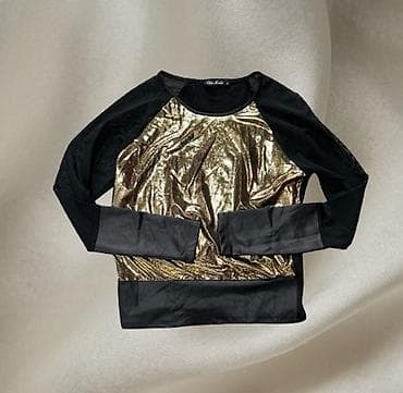 Bluza sa zlatnim frontom i crnim rukavima. S vel ostala