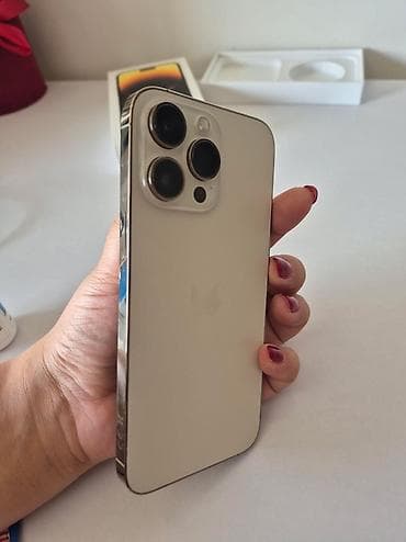 Apple iPhone: Na prodaju iPhone 14 Pro Max u Gold boji, 256GB memorije. Telefon je — 6