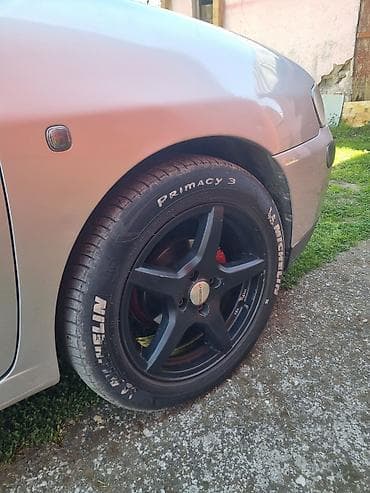 felne ili kapna: Alu felne 16" sa gumama – set 4 kom - Dizajn: 5 krakova, mat crna — 2