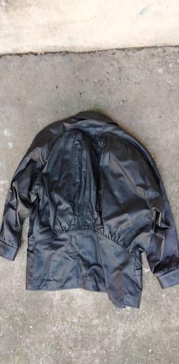 Zenska jakna Konus koza crna vel.14, ostecena postava na vratnom