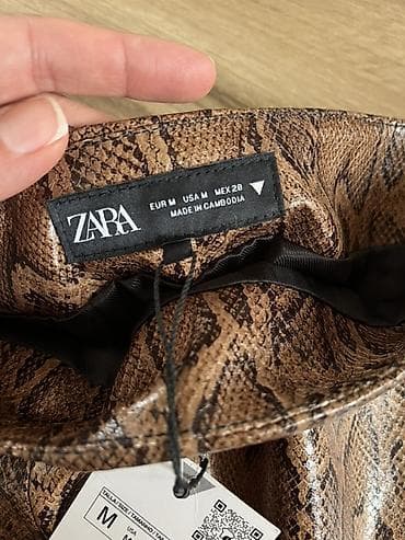 zara pantalone snizenje: ZARA mini suknja sa zmijskim printom - Brend: ZARA - Model: mini — 1