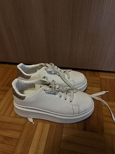 new balance 550 bele: Beli ženski patike sa platformom - Klasičan model u beloj boji sa — 4