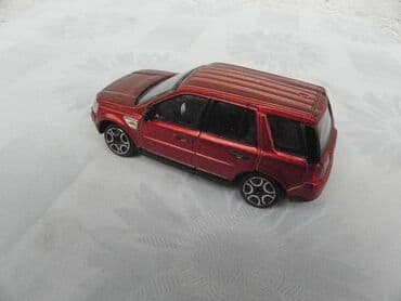 range rover igracka: Burago Land Rover Defender 2,1/ 43 ocuvan,China — 3