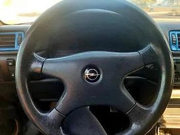 rucica za volan: VOLAN OPEL CALIBRA ORGINALAN | Dobro stanje ne uvrce se — 1