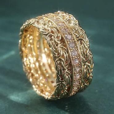 van cleef nakit cena: Zlatni prsten široke burme sa bogatim pletenim motivom i centralnim — 4