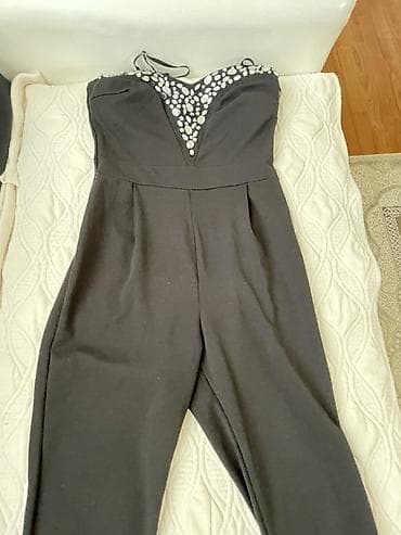 reebok classic black: Elegantni crni ženski kombinezon bez rukava. Gornji deo je korset — 2