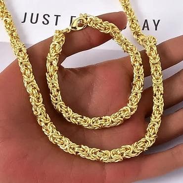 Novčanici: Zlatni set nakita – ogrlica i narukvica, pletena 🛒2,699 din. - — 2