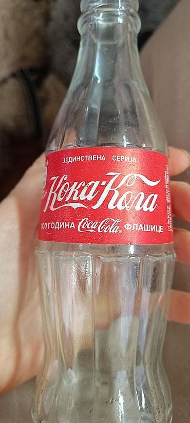 kupujem prodajem razno alati: Staklena flašica Coca‑Cola – Jedinstvena serija „100 godina Coca‑Cola — 1