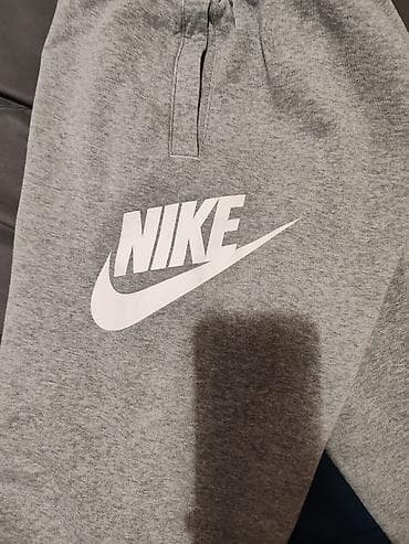 nike air force zenske bele: Nike muške trenerke – sivi melanž - Model: klasične džoger pantalone — 1