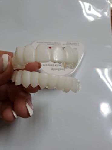 zlatne navlake za zube: Snap on Smile navlake za zube
Cena:3000din/par — 3